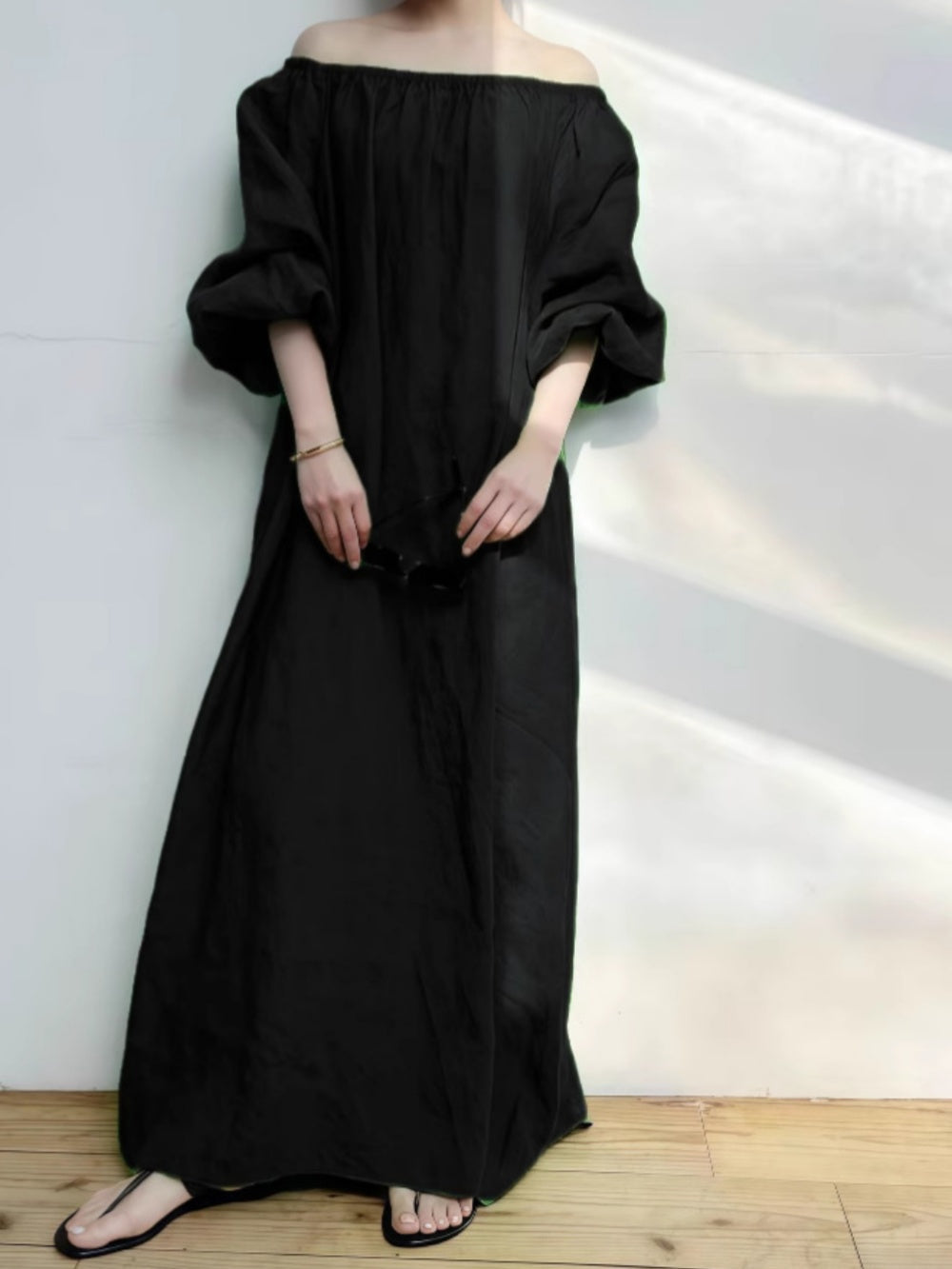 Casual loose-flowing off-the-shoulder dress in solid color