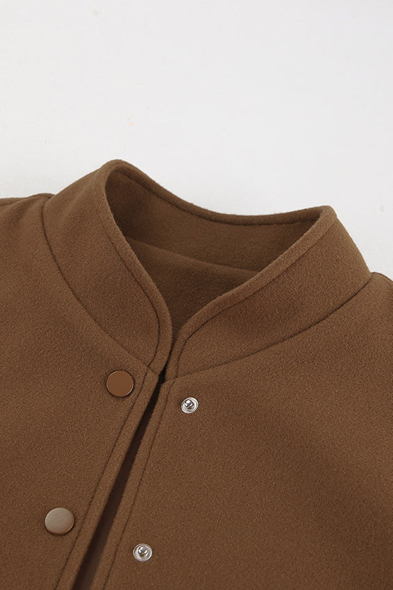 Thick brown wool coat with elastic hem for a warm and comfortable style