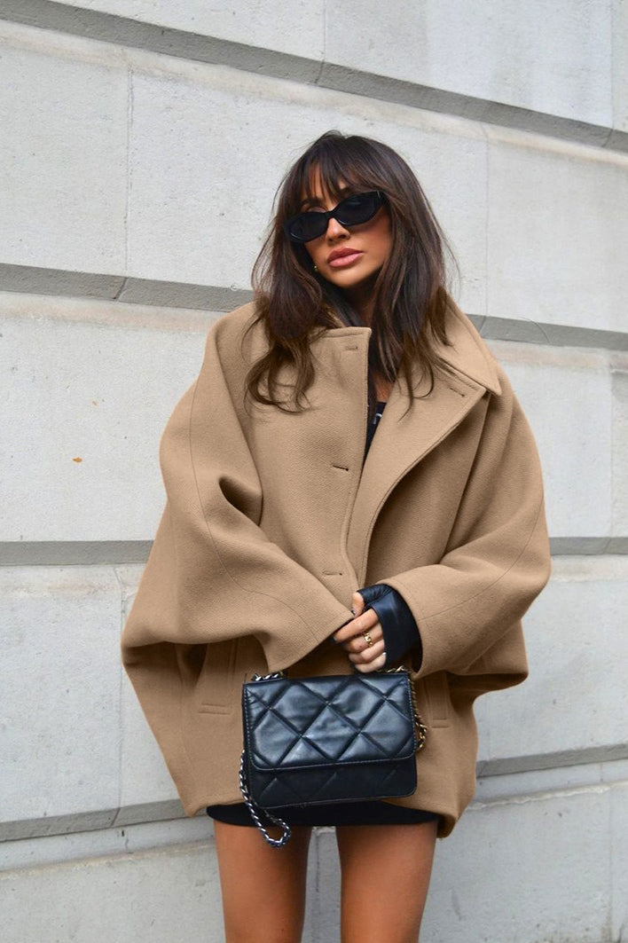 Oversized wool coat with bat wing sleeves