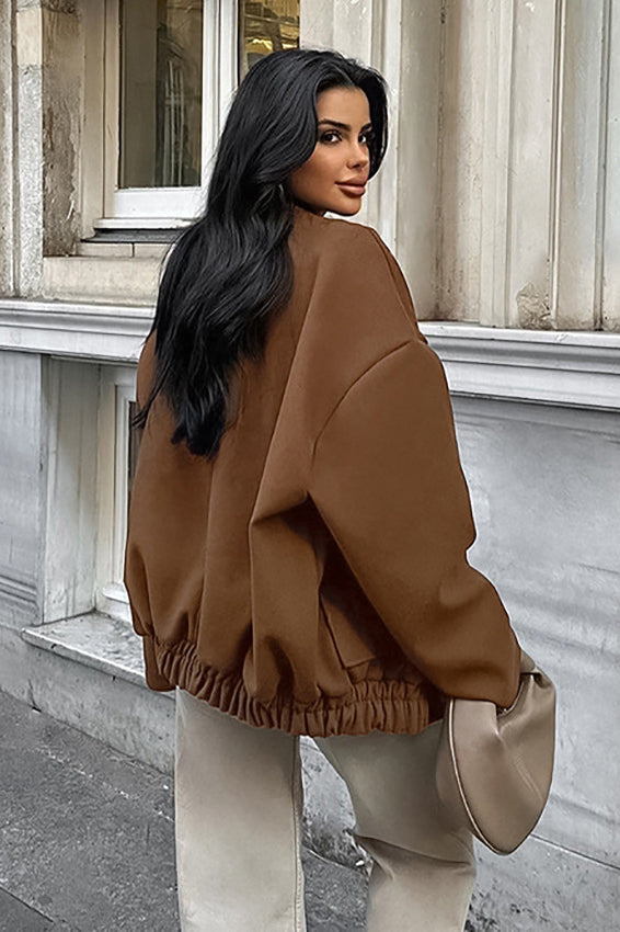 Thick brown wool coat with elastic hem for a warm and comfortable style