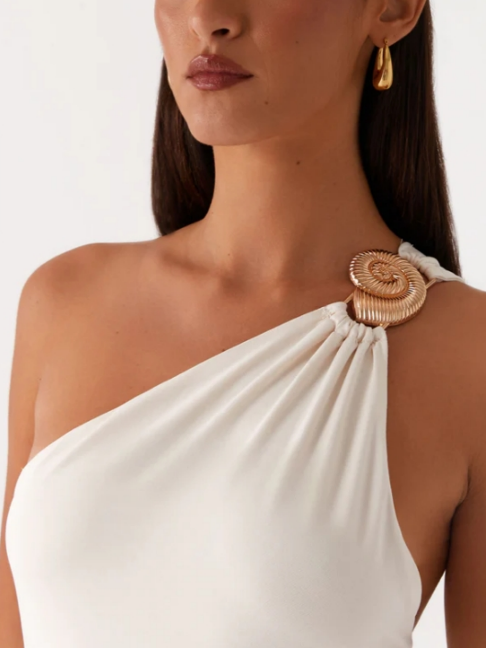 Asymmetric dress with metal loop and elegant tie on one shoulder