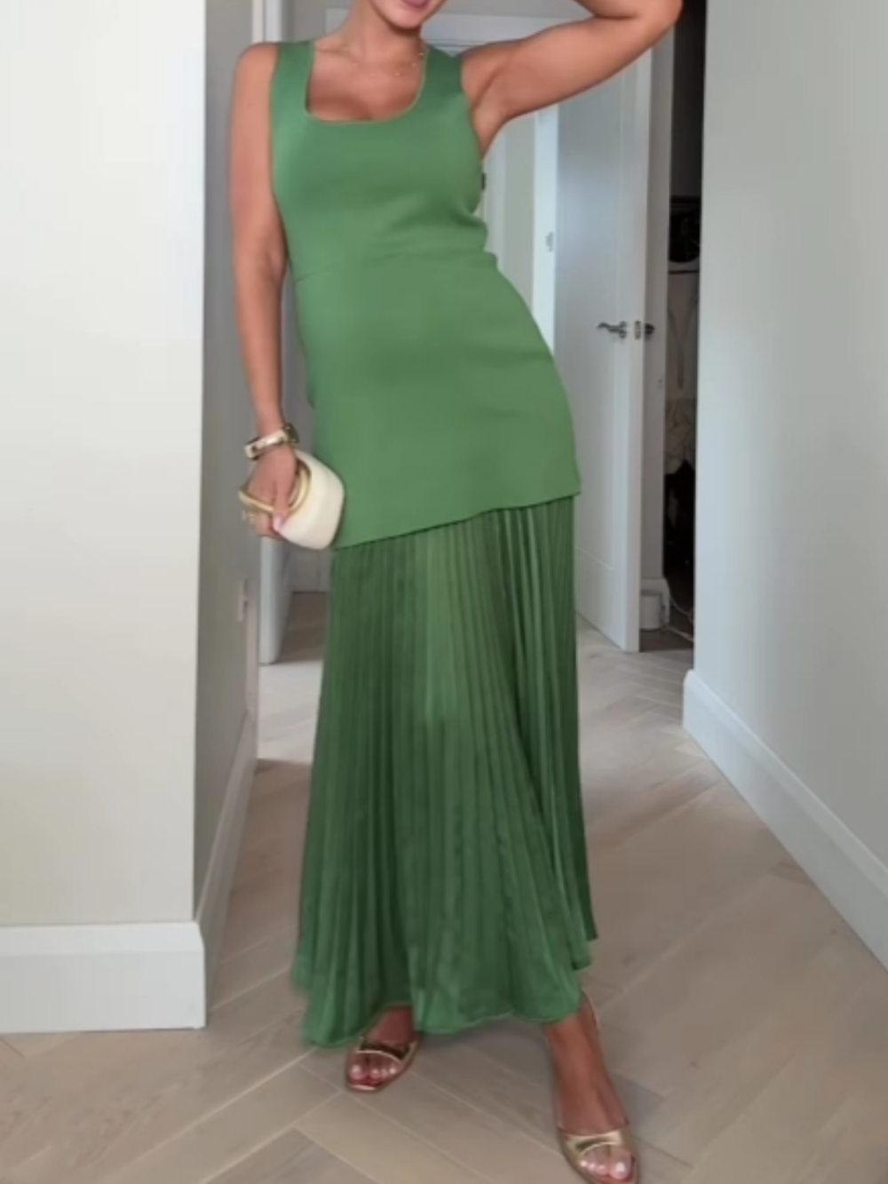 Small fitted knitted dress with elegant pleats and patchwork