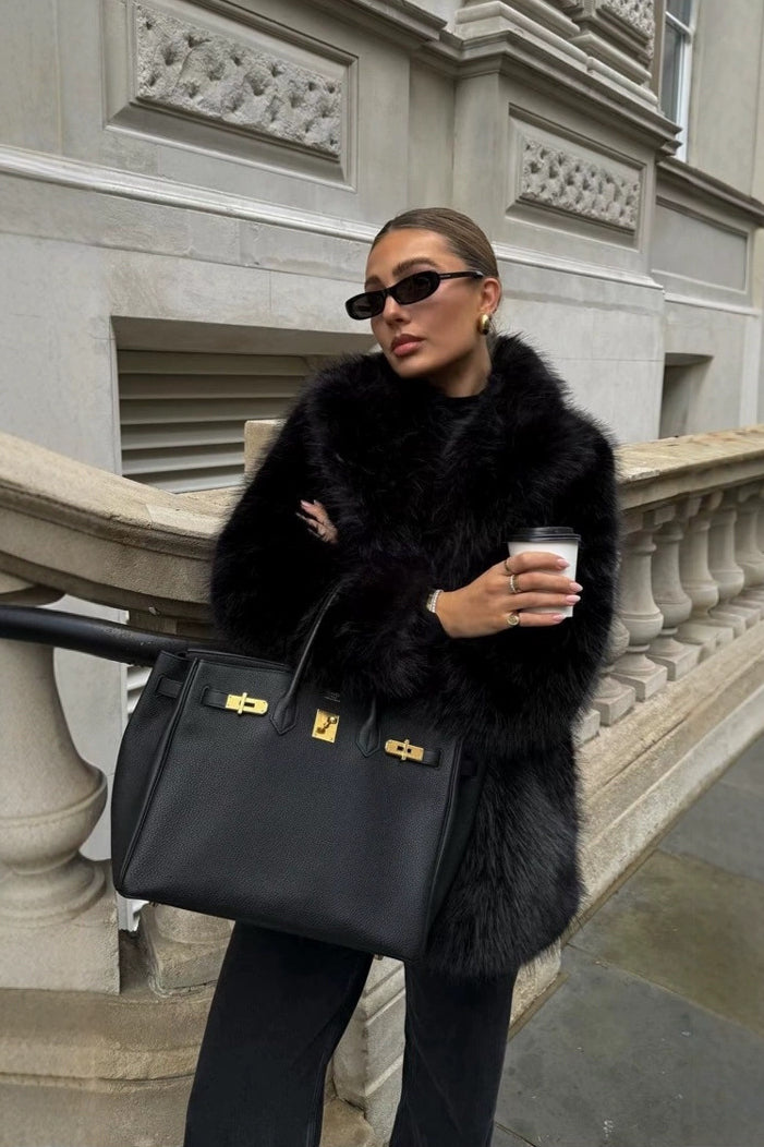 Solid and trendy eco-friendly faux fur coat