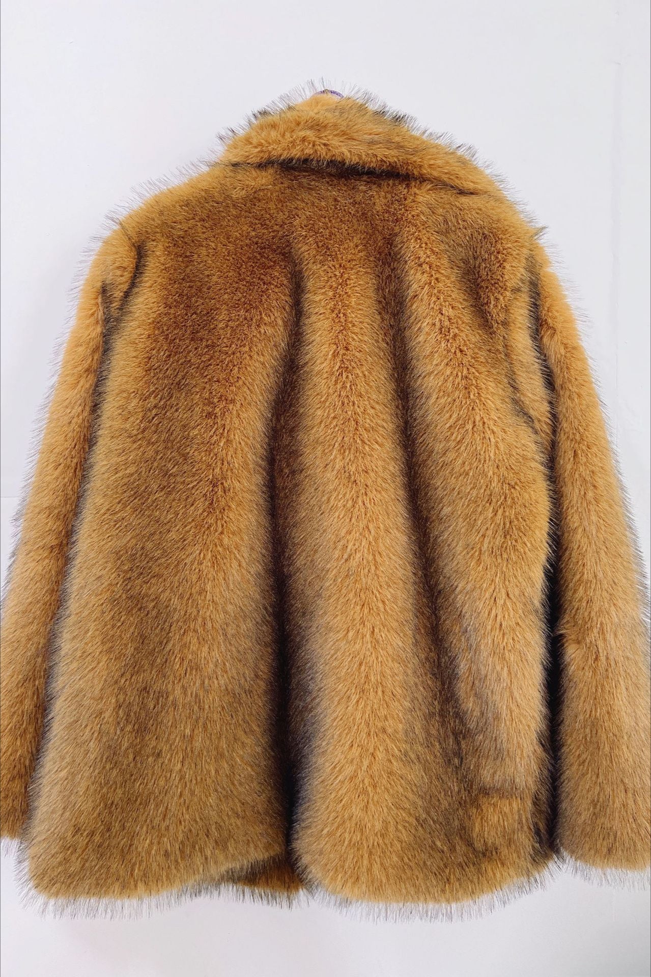 Elegant and comfortable medium-length synthetic fur blazer