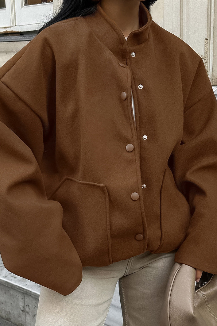 Thick brown wool coat with elastic hem for a warm and comfortable style