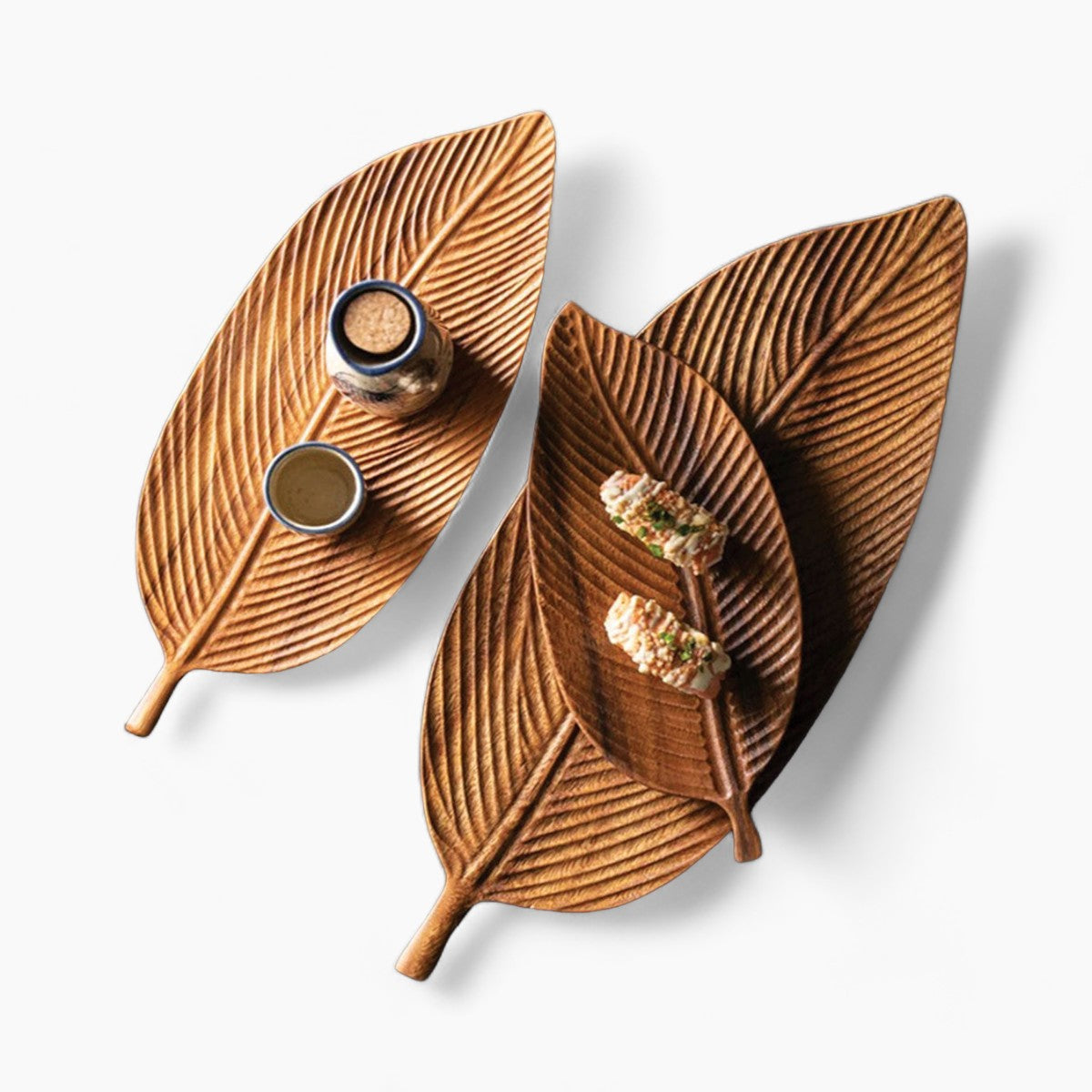 Bowl made of dark walnut wood with leaves