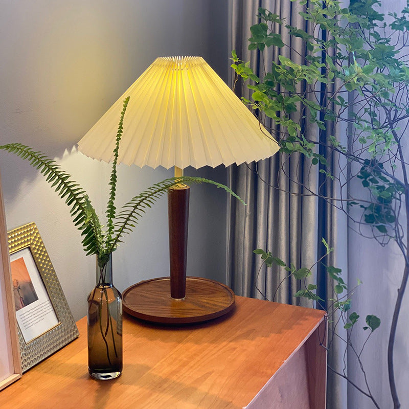 Elegant vintage table lamp made of noble pleated wood