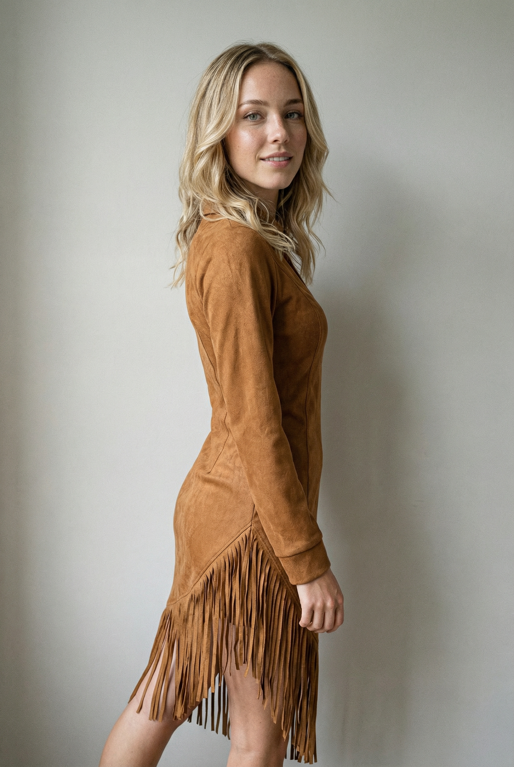 Suede midi dress with long sleeves and irregular fringes