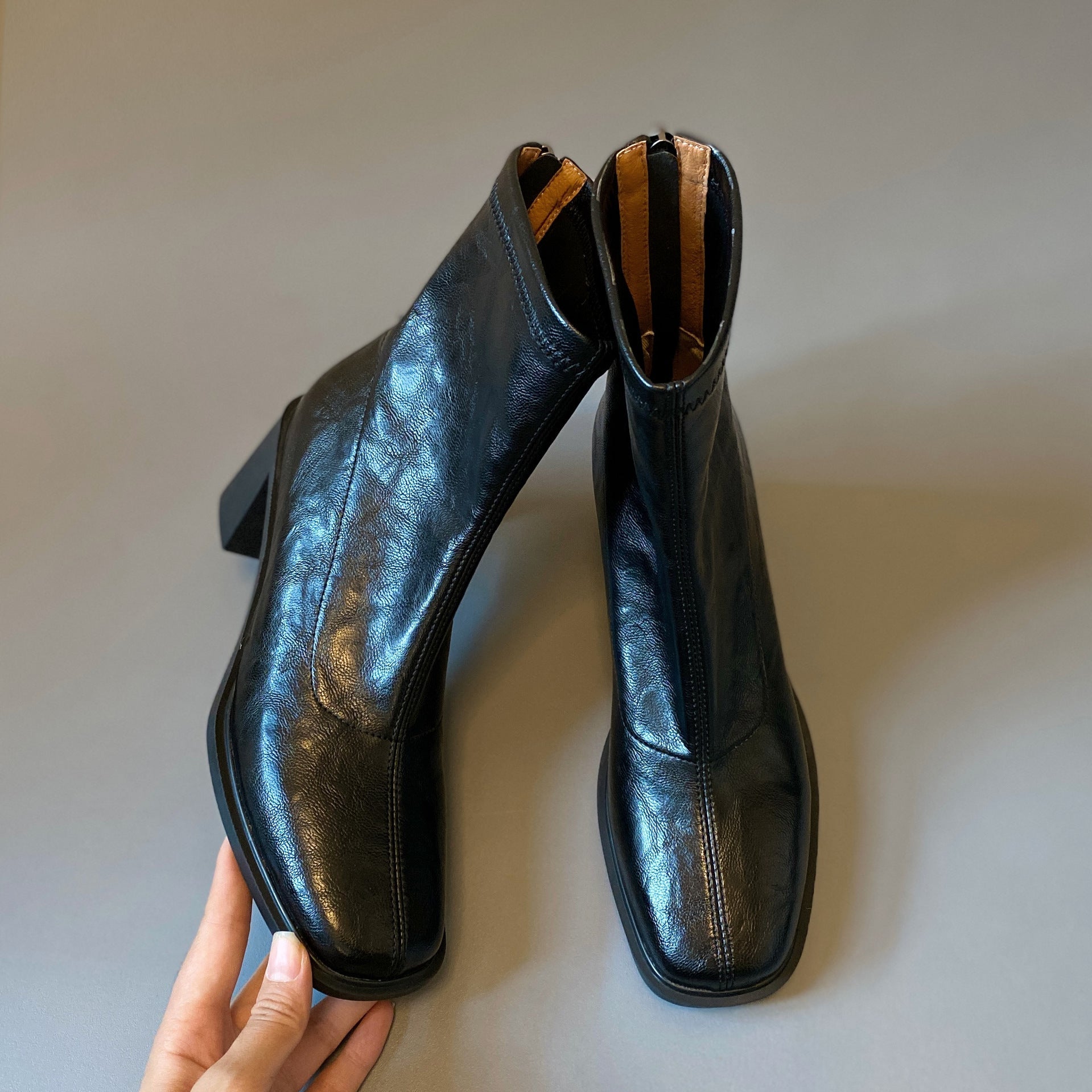 Square-toe boots with a block heel