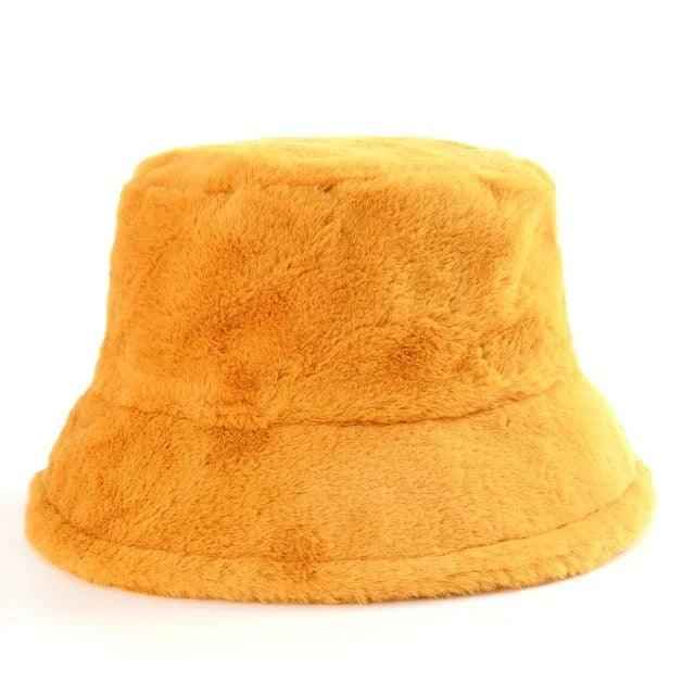 Jasmine – Elegant winter bucket hat made of faux fur in cow-leopard print