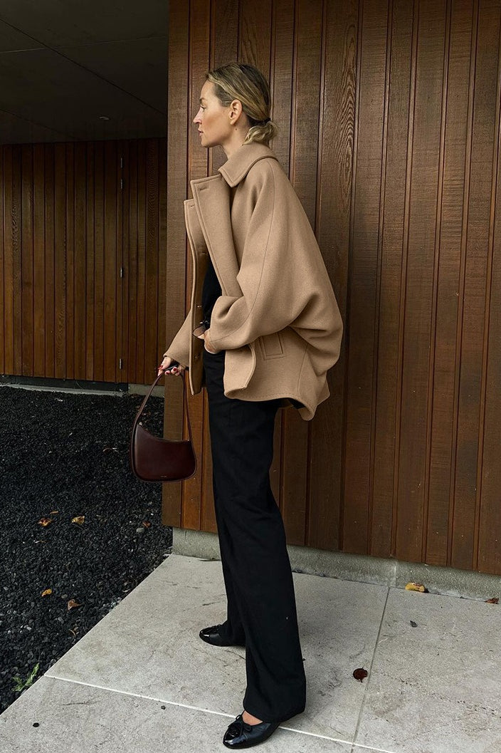 Oversized wool coat with bat wing sleeves