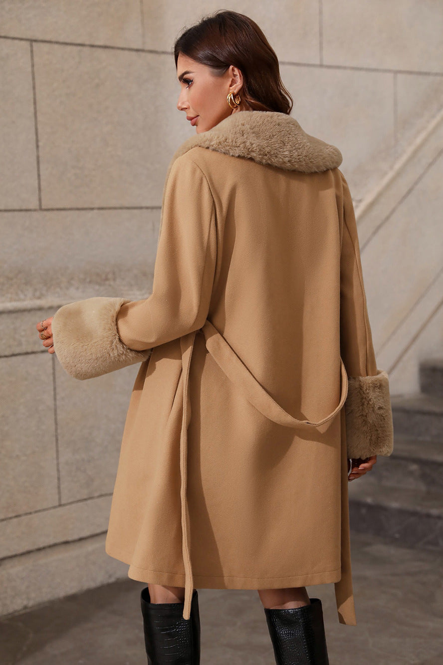 Stylish mid-trench coat with fur collar and waist belt