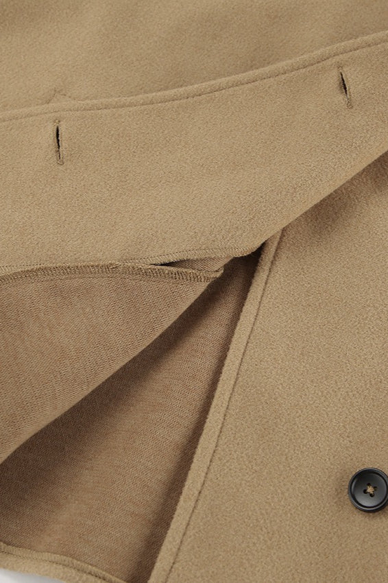 Oversized wool coat with bat wing sleeves