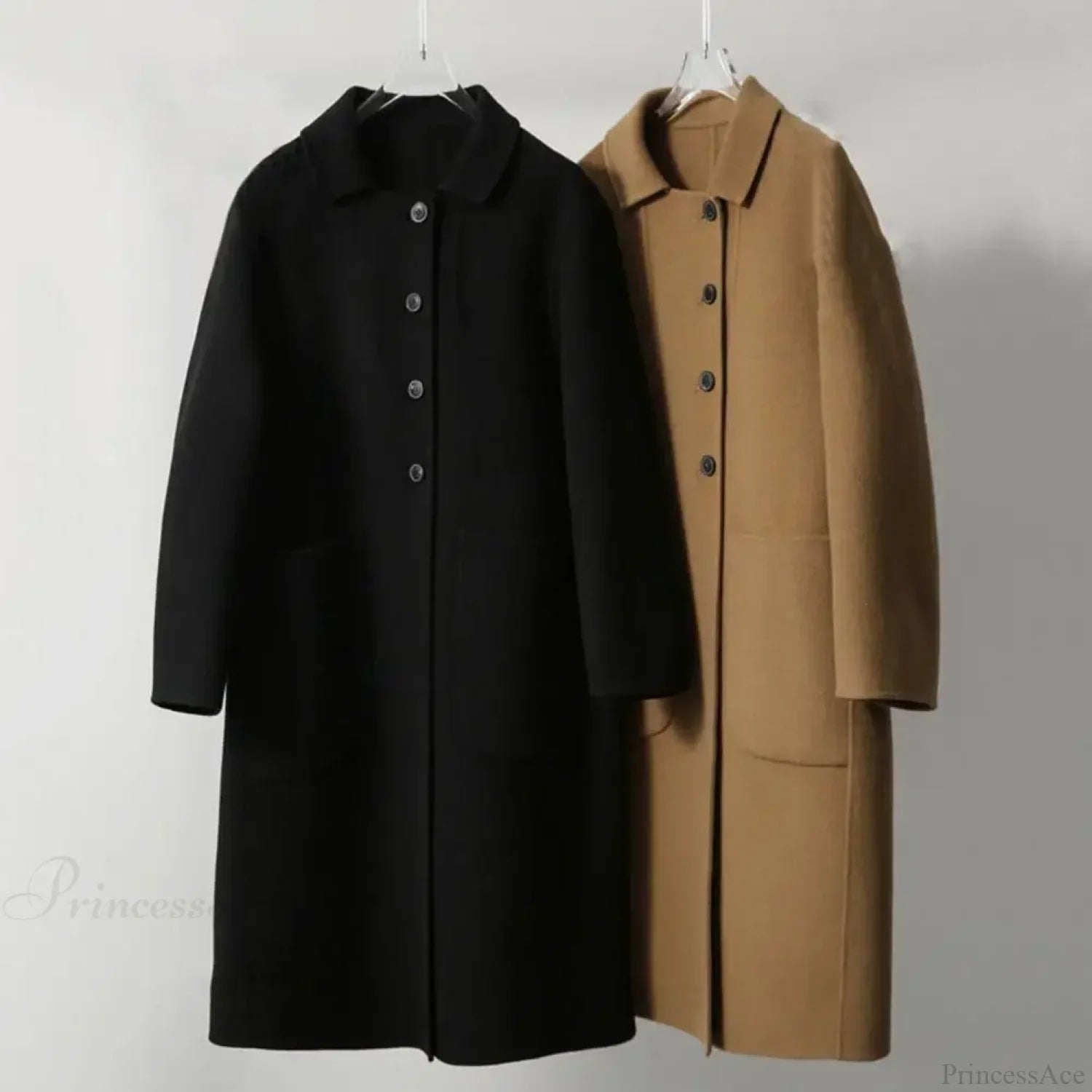 The Elegant Black O-Neck Puff Sleeve Overcoat for a Chic and Stylish Look