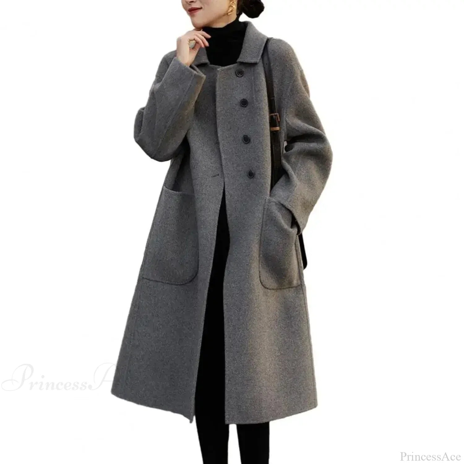 The Elegant Black O-Neck Puff Sleeve Overcoat for a Chic and Stylish Look