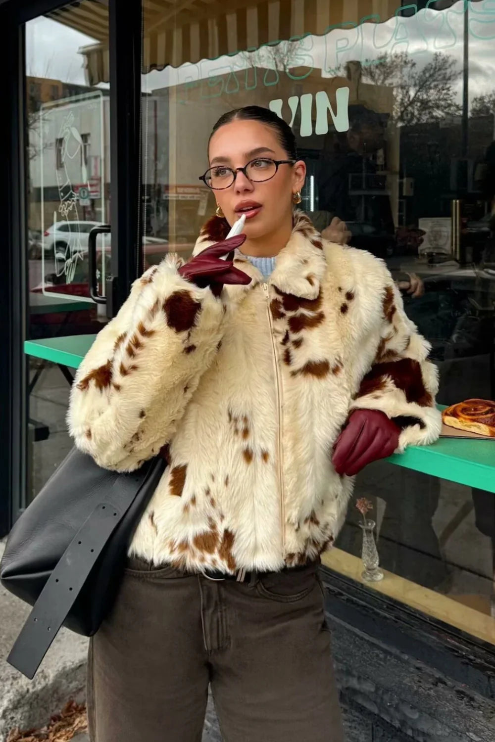 Warm faux fur coat with leopard print, cozy and elegant