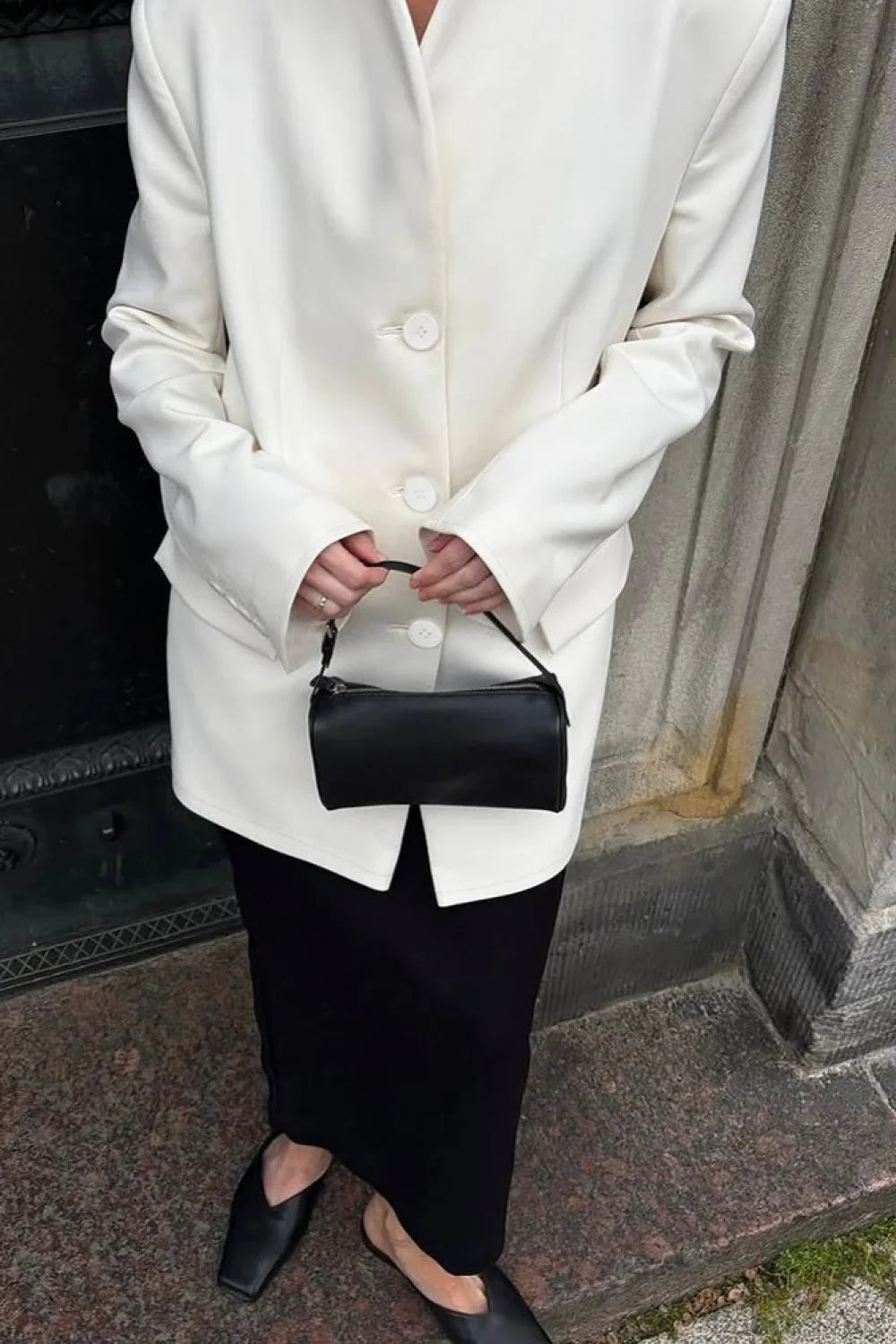 Minimalist white coat with an elegant and casual V-neck collar