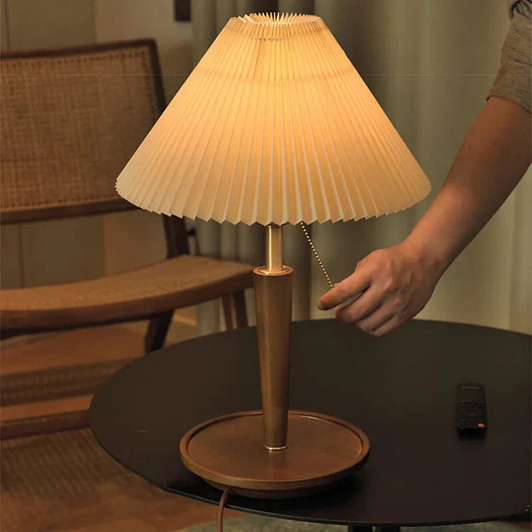 Elegant vintage table lamp made of noble pleated wood