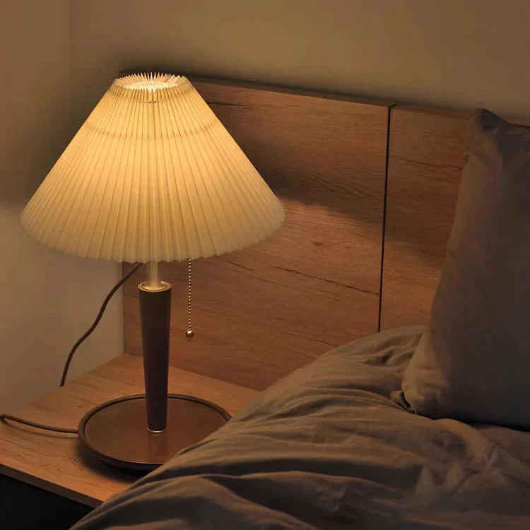 Elegant vintage table lamp made of noble pleated wood