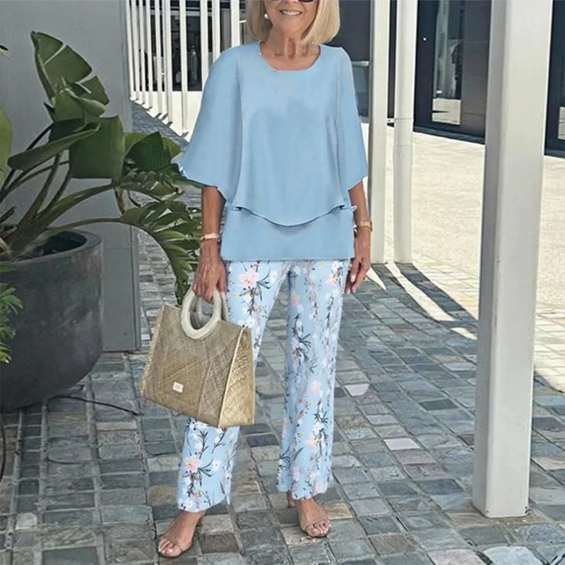 Matching set of printed pants and trendy two-piece top