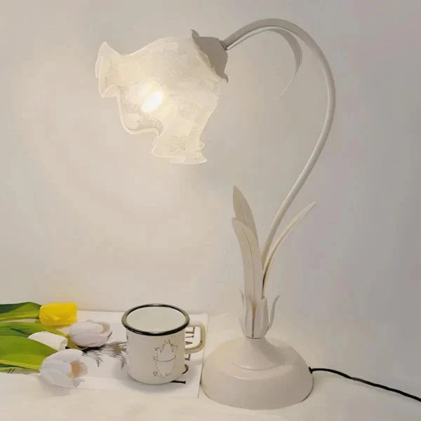 Elegant vintage table lamp with adjustable floral design
