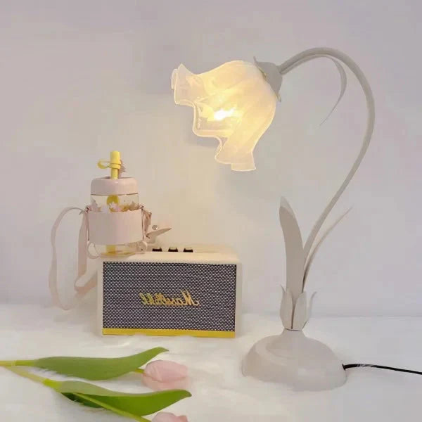 Elegant vintage table lamp with adjustable floral design