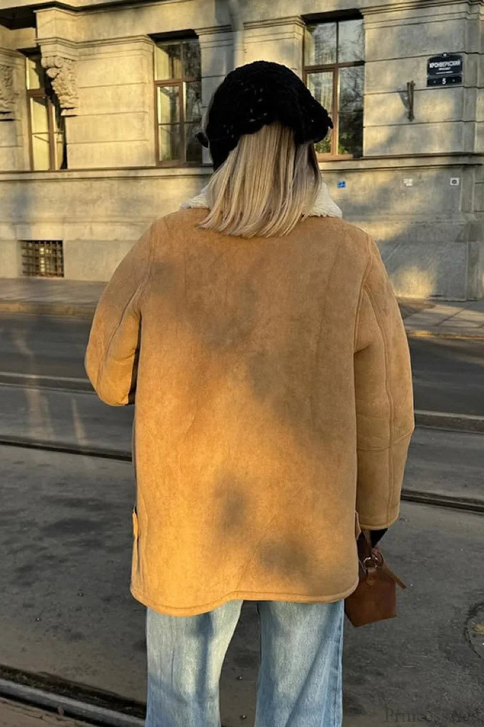 Vintage suede coat with sherpa lining and wide lapel collar