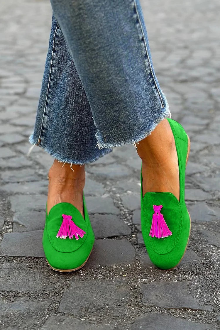 Green Loafer with a Bold Fuchsia Tassel