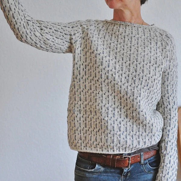 Elegant women's sweater with a stylish boat neckline