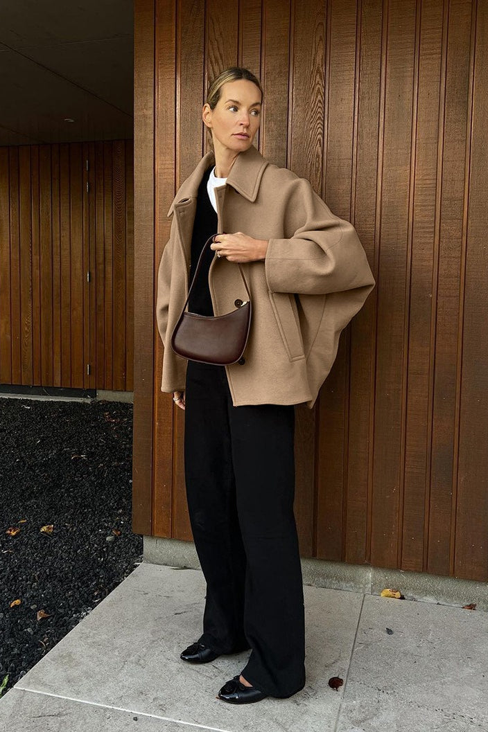 Oversized wool coat with bat wing sleeves