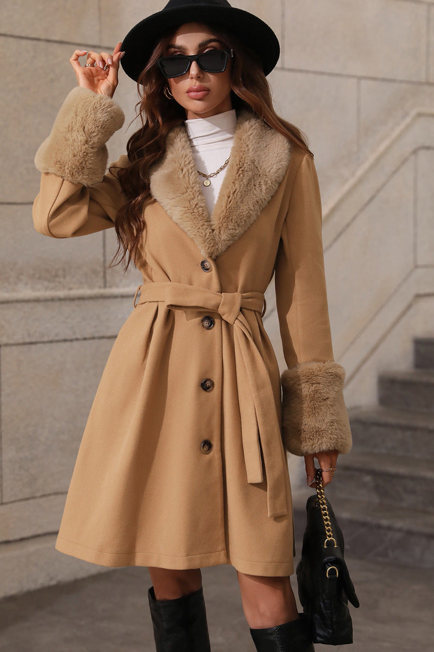 Stylish mid-trench coat with fur collar and waist belt