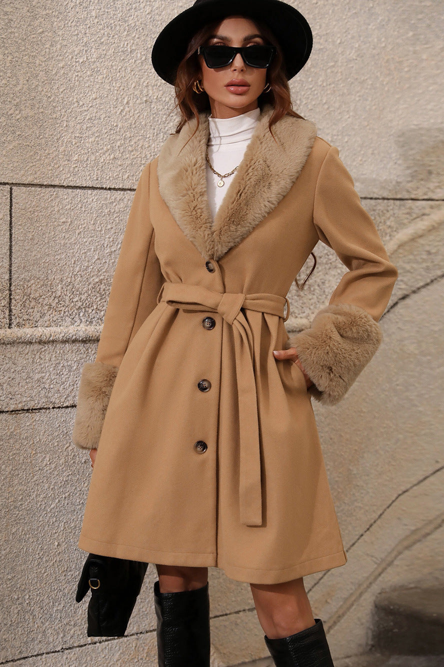 Stylish mid-trench coat with fur collar and waist belt