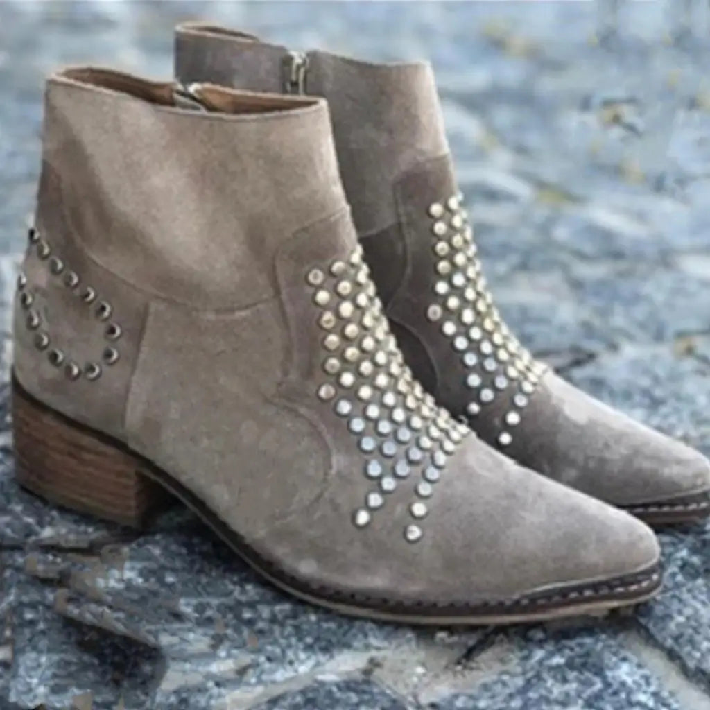 Ankle high stiletto shoes with studded details for a bold look