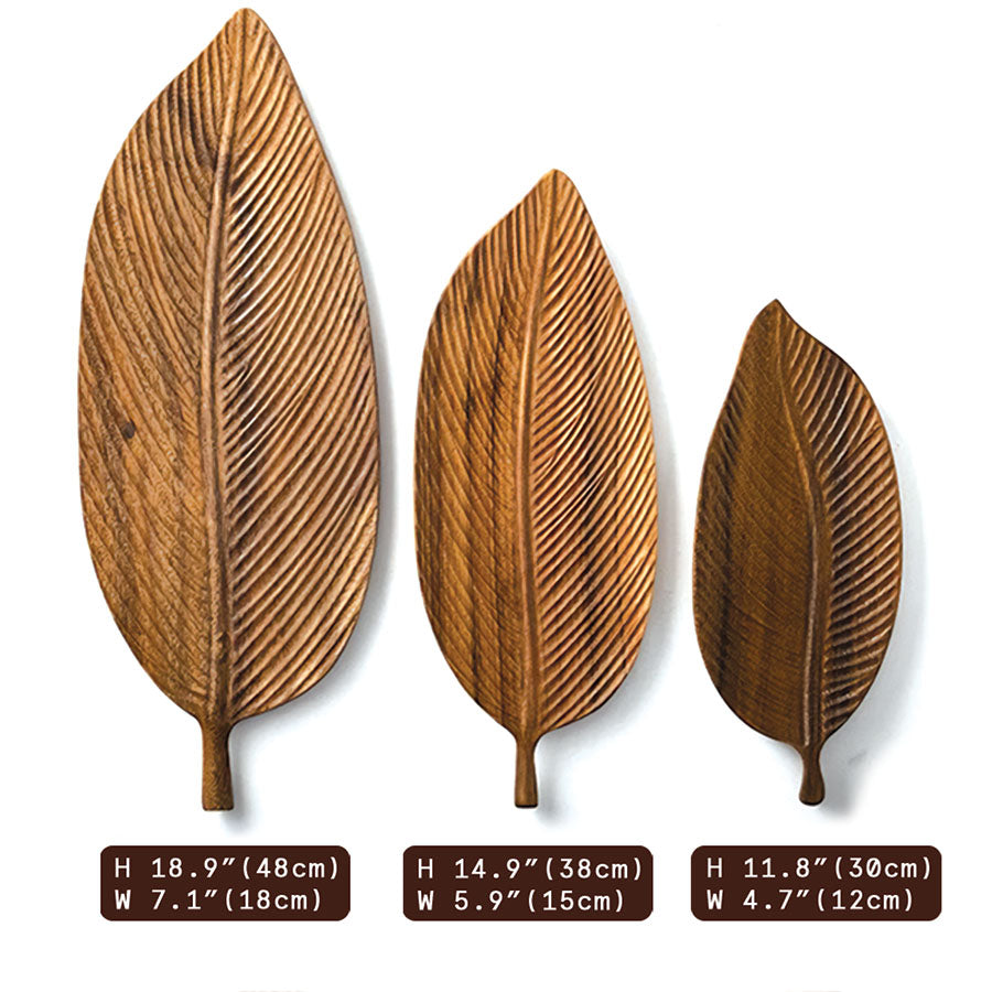 Bowl made of dark walnut wood with leaves