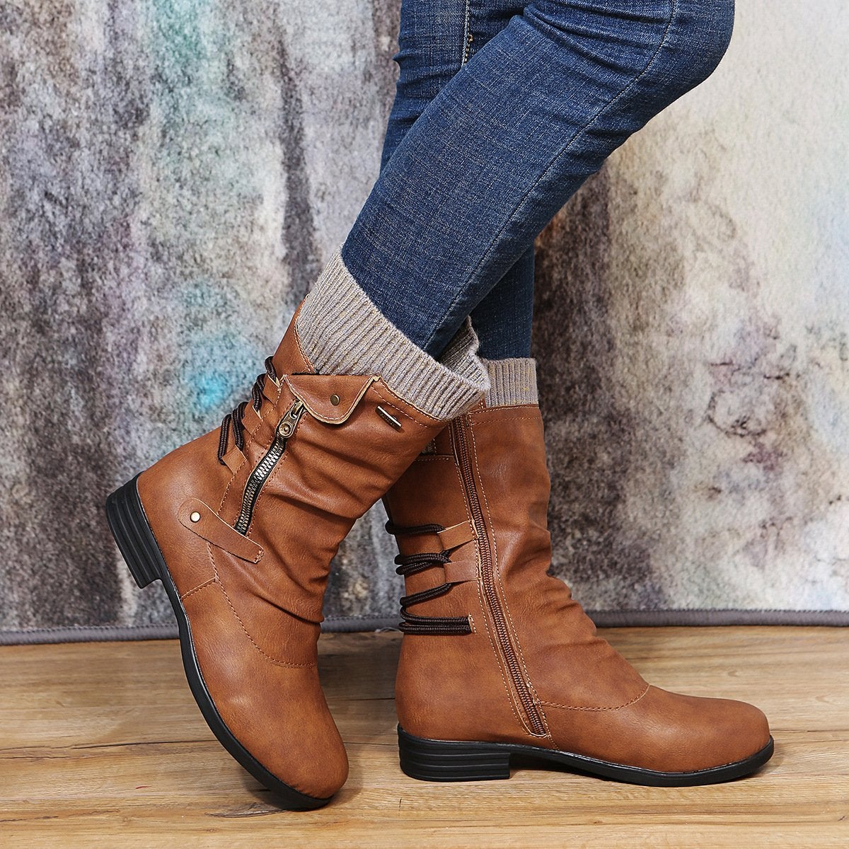 Women's stylish boots with a side zipper and a comfortable flat heel