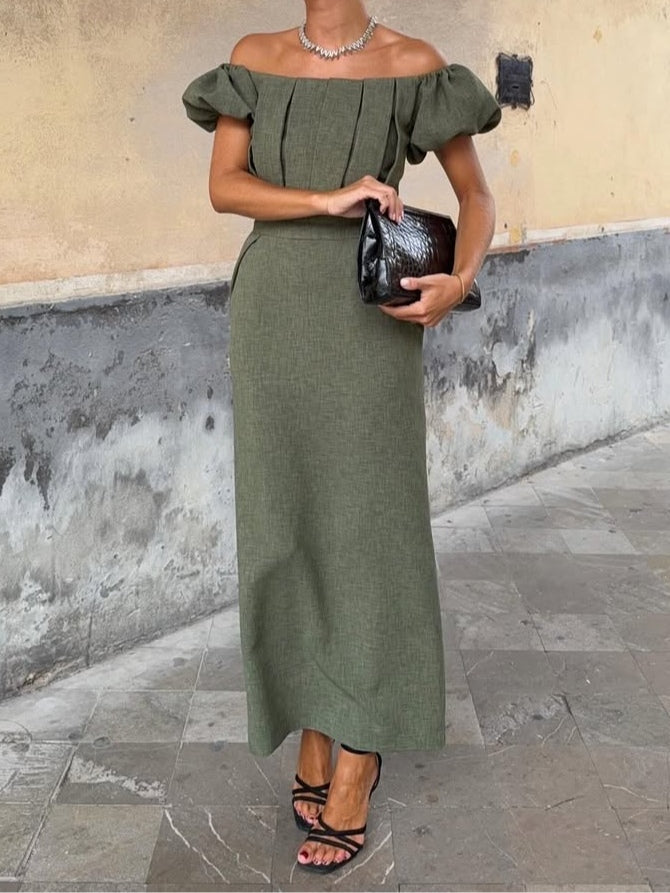 Elegant one-shoulder dress with puff sleeve and refined pleats
