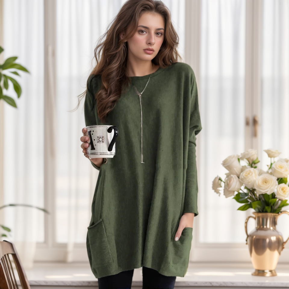 Stylish women's long sweater with spacious side pockets