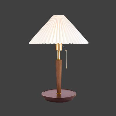 Elegant vintage table lamp made of noble pleated wood