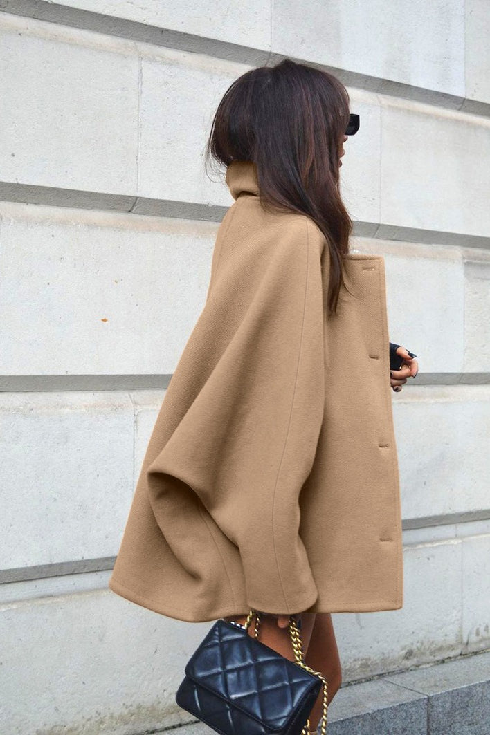 Oversized wool coat with bat wing sleeves