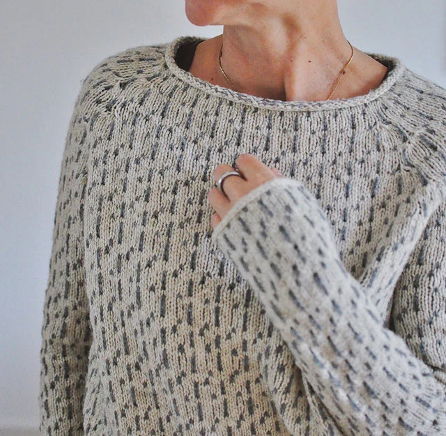 Elegant women's sweater with a stylish boat neckline