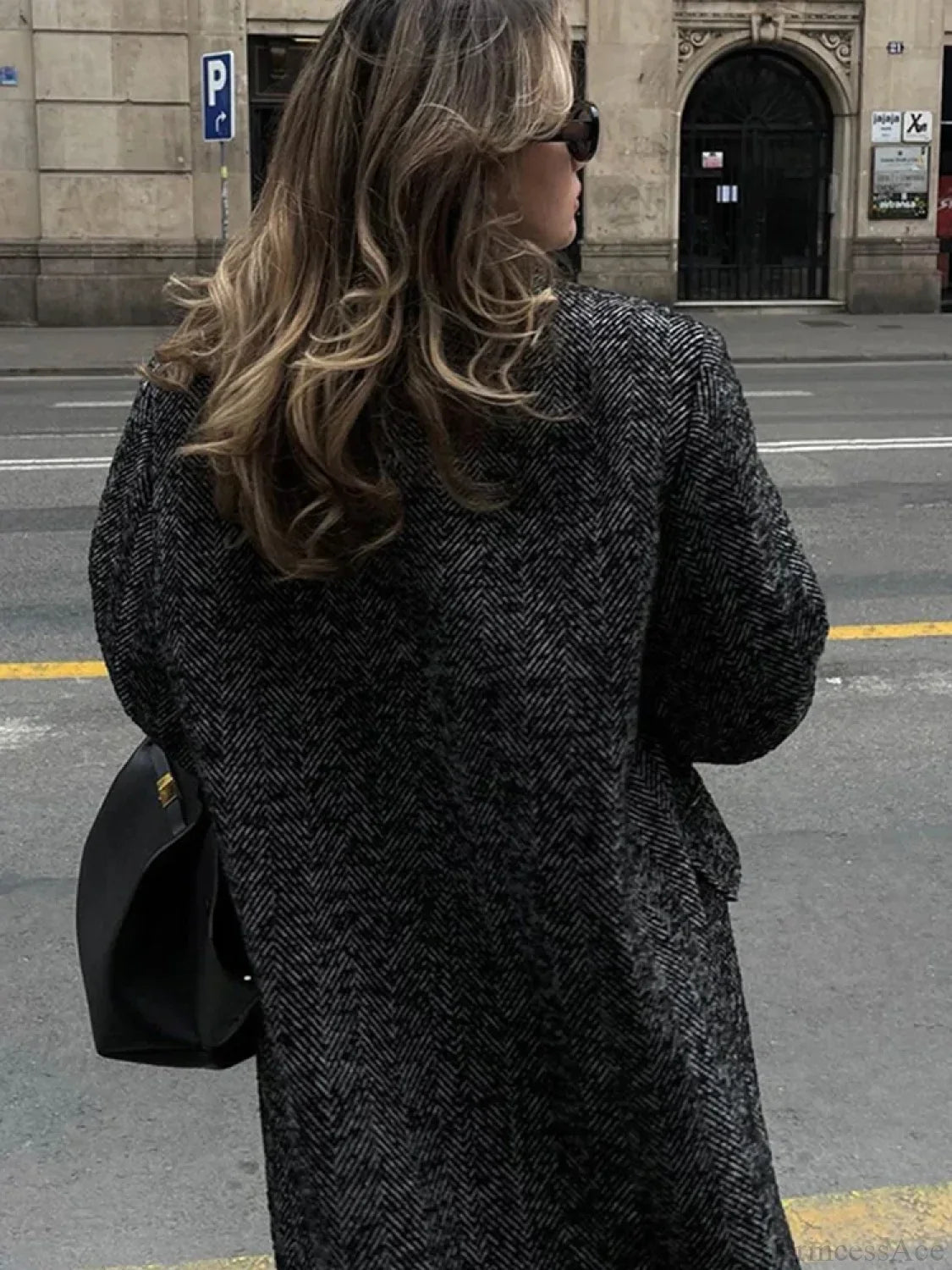 Oversized coat with laces and stylish patchwork