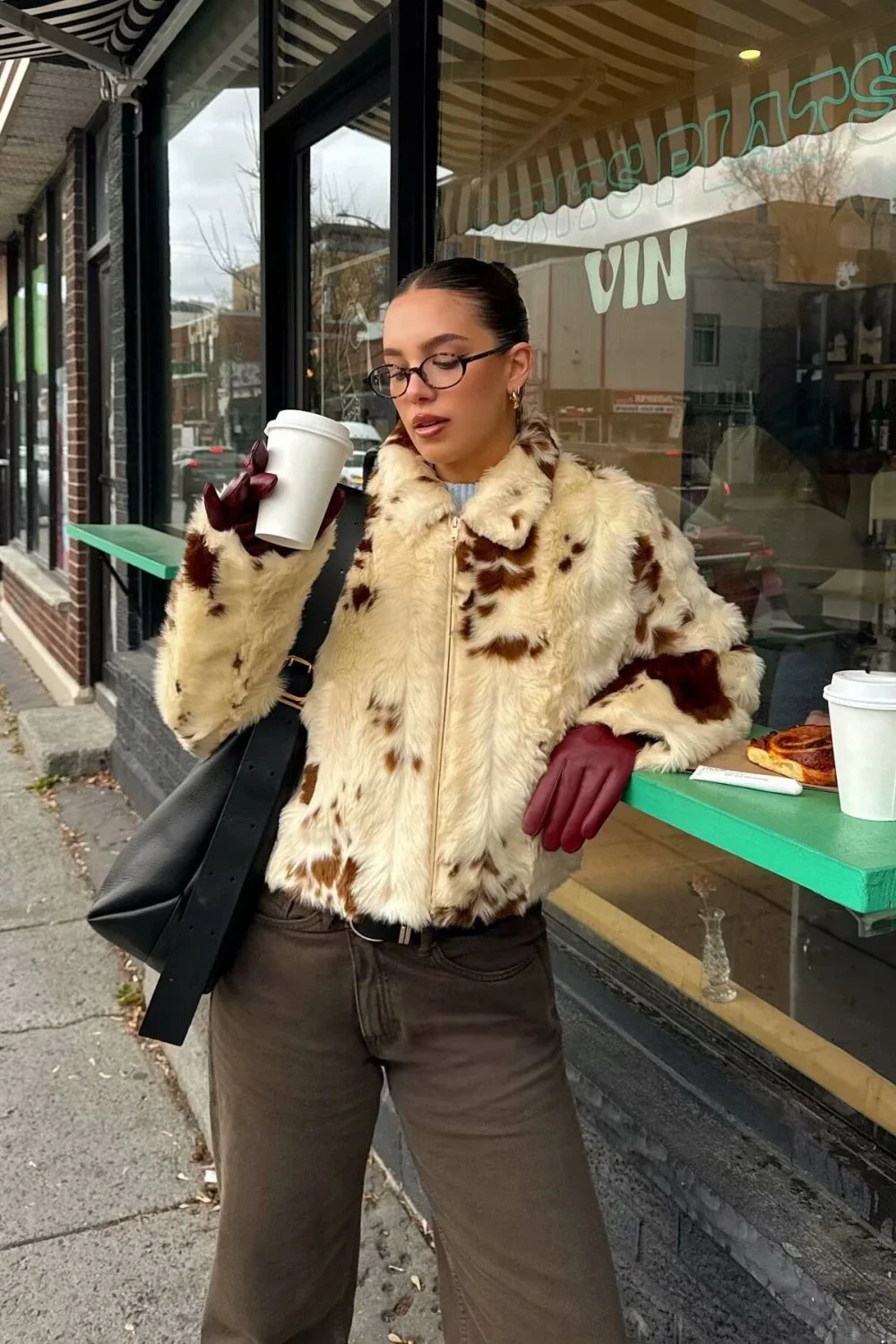 Warm faux fur coat with leopard print, cozy and elegant