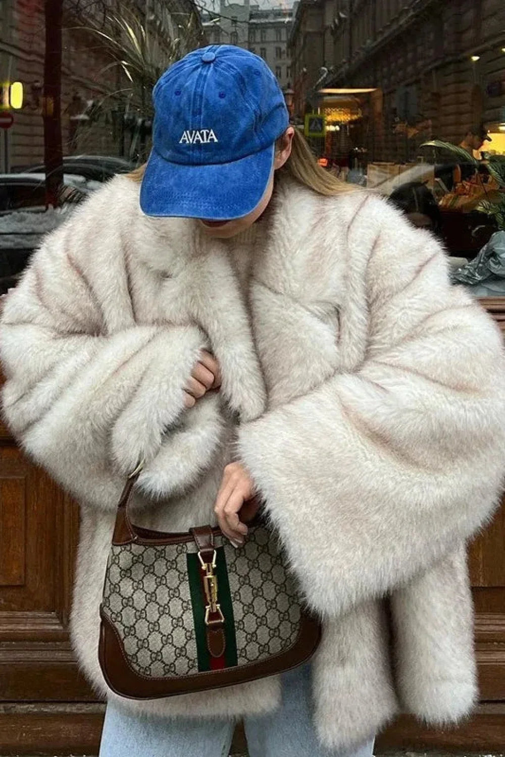 Oversized faux fox fur coat in solid colors with minimalist plush finish