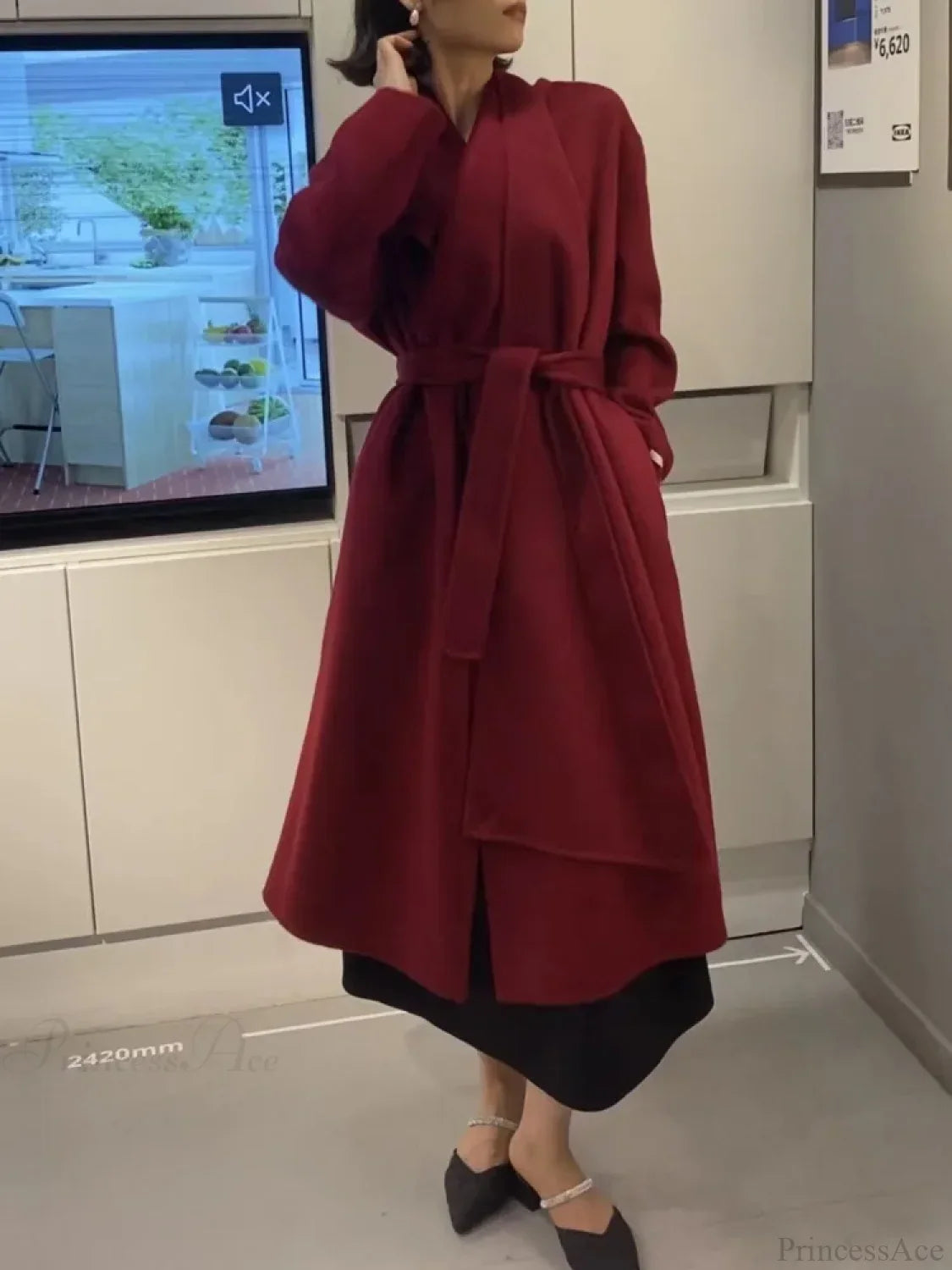 Double-breasted wool coat with scarf collar for a chic and warm style