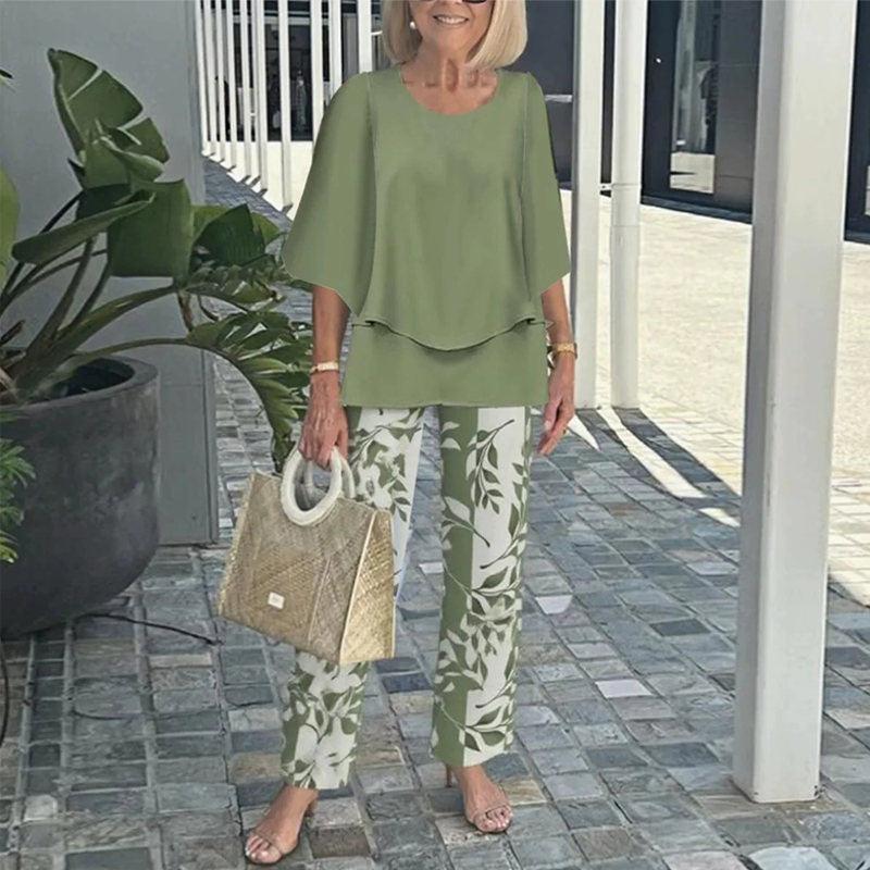 Matching set of printed pants and trendy two-piece top