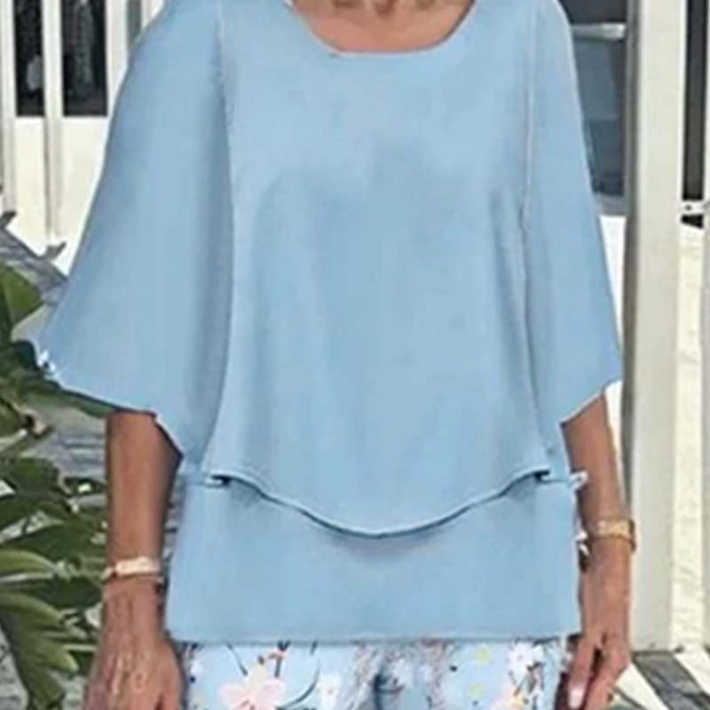 Matching set of printed pants and trendy two-piece top