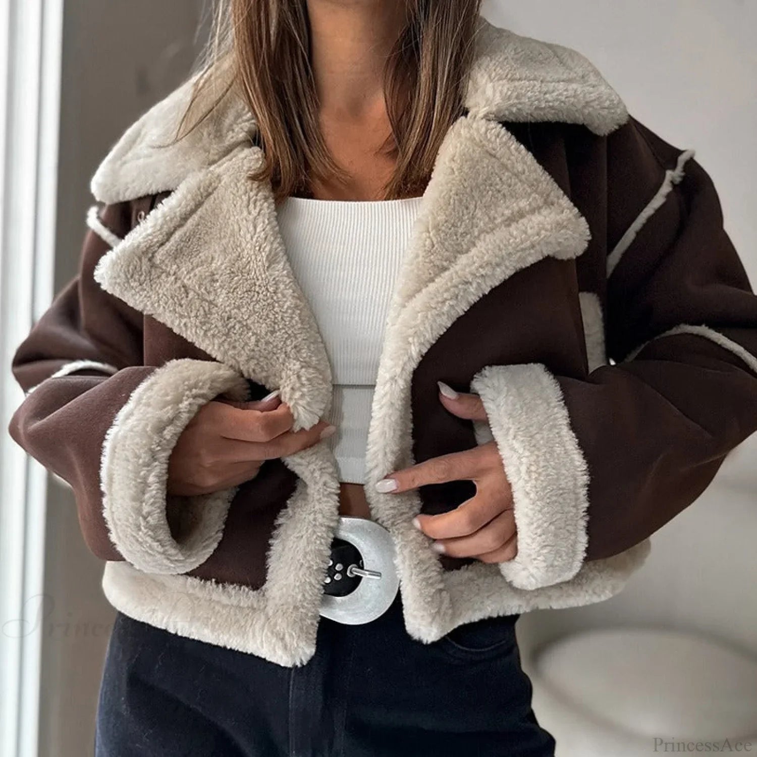 Long sleeve coat with fleece lining, wide lapel, and cropped suede design