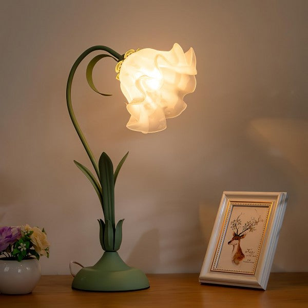 Elegant vintage table lamp with adjustable floral design
