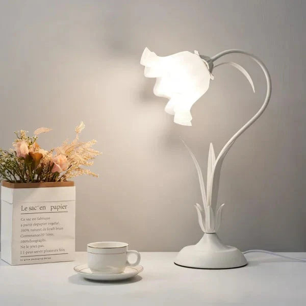 Elegant vintage table lamp with adjustable floral design