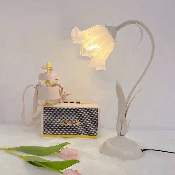 Elegant vintage table lamp with adjustable floral design